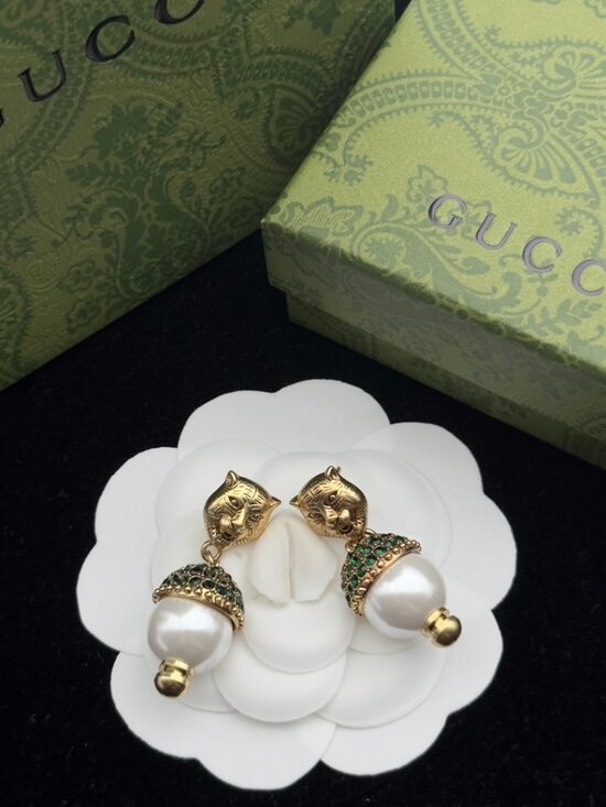 Dresses & Skirts - Gucci portrait earrings